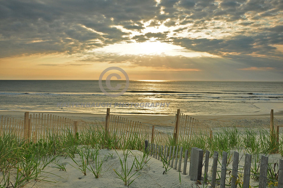 DSC_0254 Beach fence sunrise